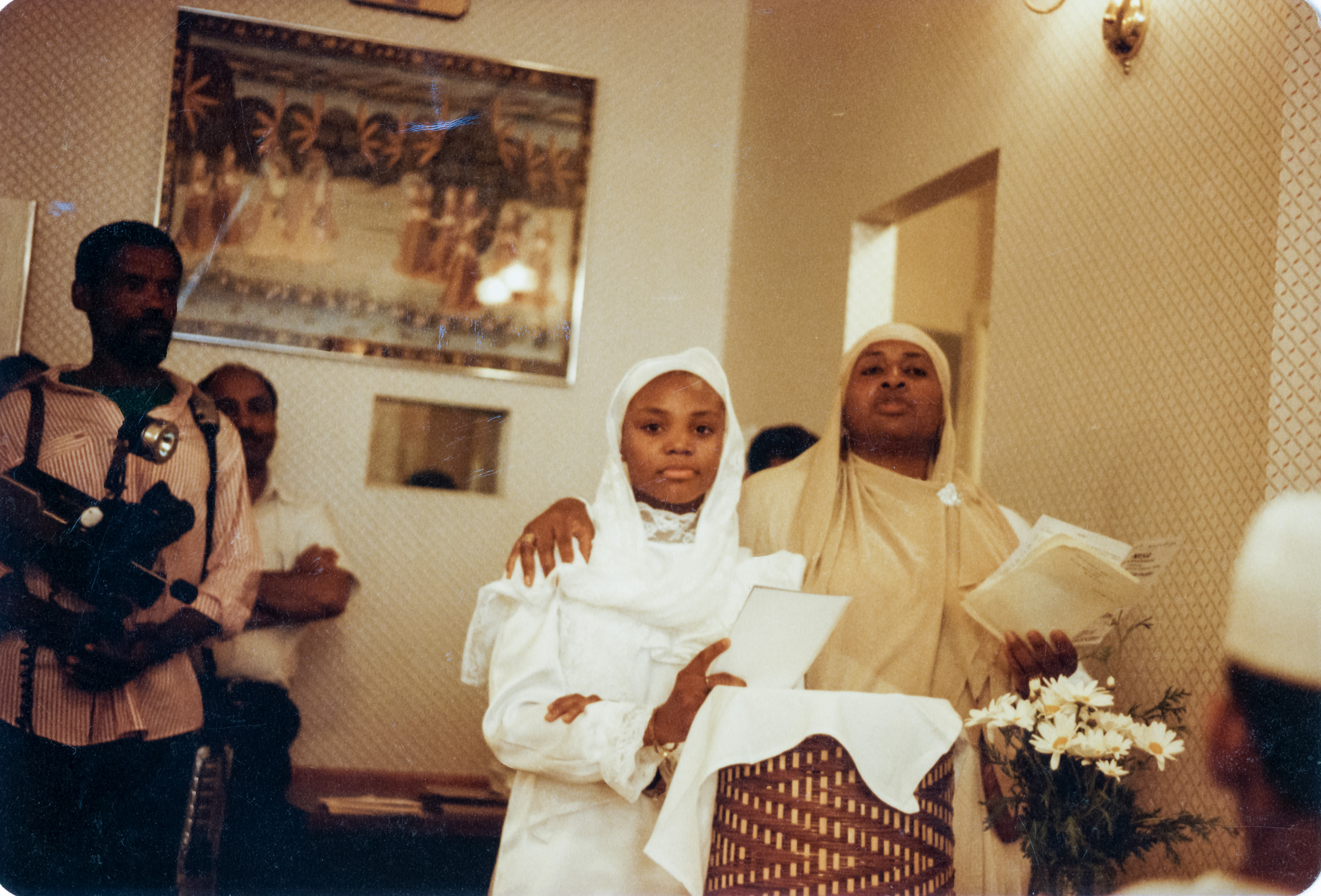 Sis. Aliyah honors graduate Shanique at the India House in Brooklyn.